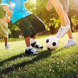 kids-playing-soccer-ball