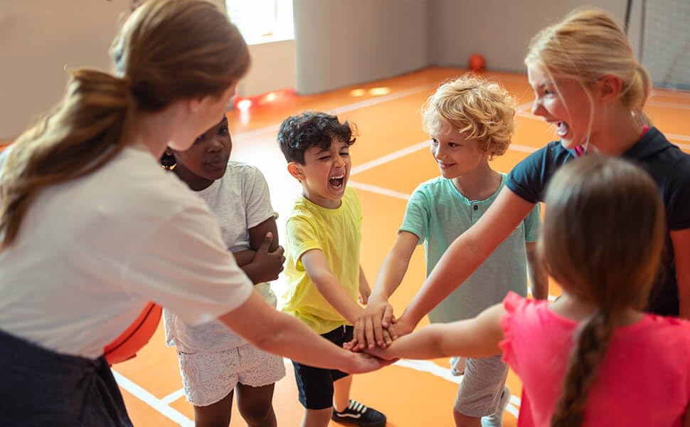 kids-playing-at-recess-with-basketball-soccer-dodgeball-football